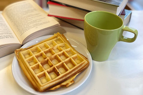 Waffle, mug and books