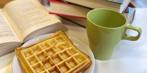 Waffle, mug and books