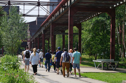 People walking on the premises of Zeche Zollverein. 