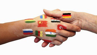 Handshake of two hands printed with flags