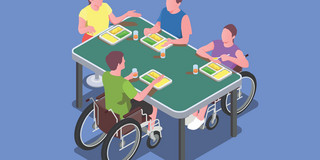 Vier Menschen im Rollstuhl sitzen an einem Tisch