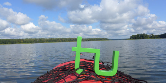 TU logo tied to a kayak