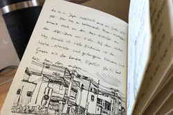 Tagebuch mit handschriftlichem Eintrag und Zeichnungen von Eindrücken in Nagoya