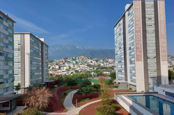 Wohnheim Ausblick über einen Park mit Häusern im Hintergrund