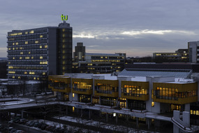 Campus North with the main dining hall and the mathematics tower in the evening in winter