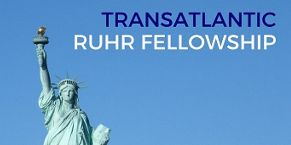 Statue of Liberty in front of a blue sky