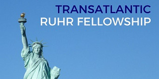 Statue of Liberty in front of a blue sky