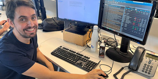 Arthur Cagliari sitting at a desk