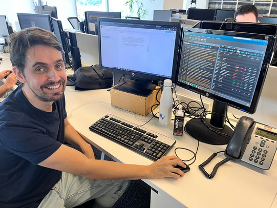 Arthur Cagliari sitting at a desk
