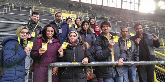 International doctoral students on the grandstand in Signal-Iduna-Stadion