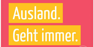 Postkarte, auf der "Ausland geht immer" steht