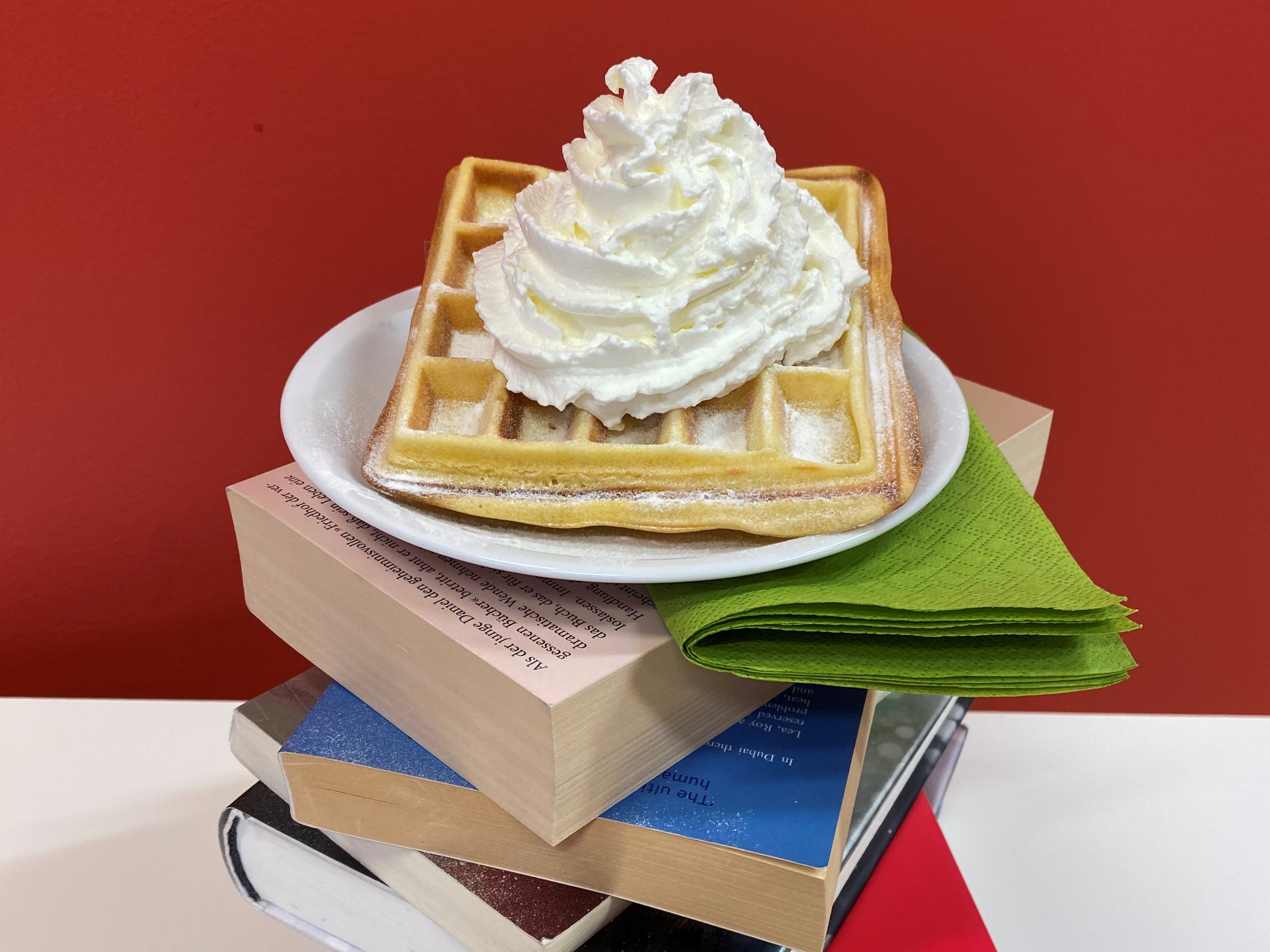 Eat & Read Waffle with cream on book tower