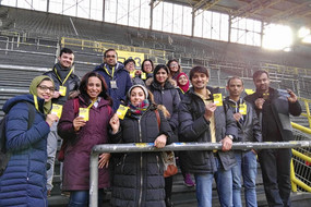 International doctoral students on the grandstand in Signal-Iduna-Stadion