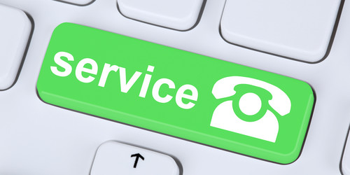 Auf einer weißen Tastatus ist eine Taste grün eingefärbt. In weiß steht darauf das Wort „service” und das Symbol eines Telefons.
